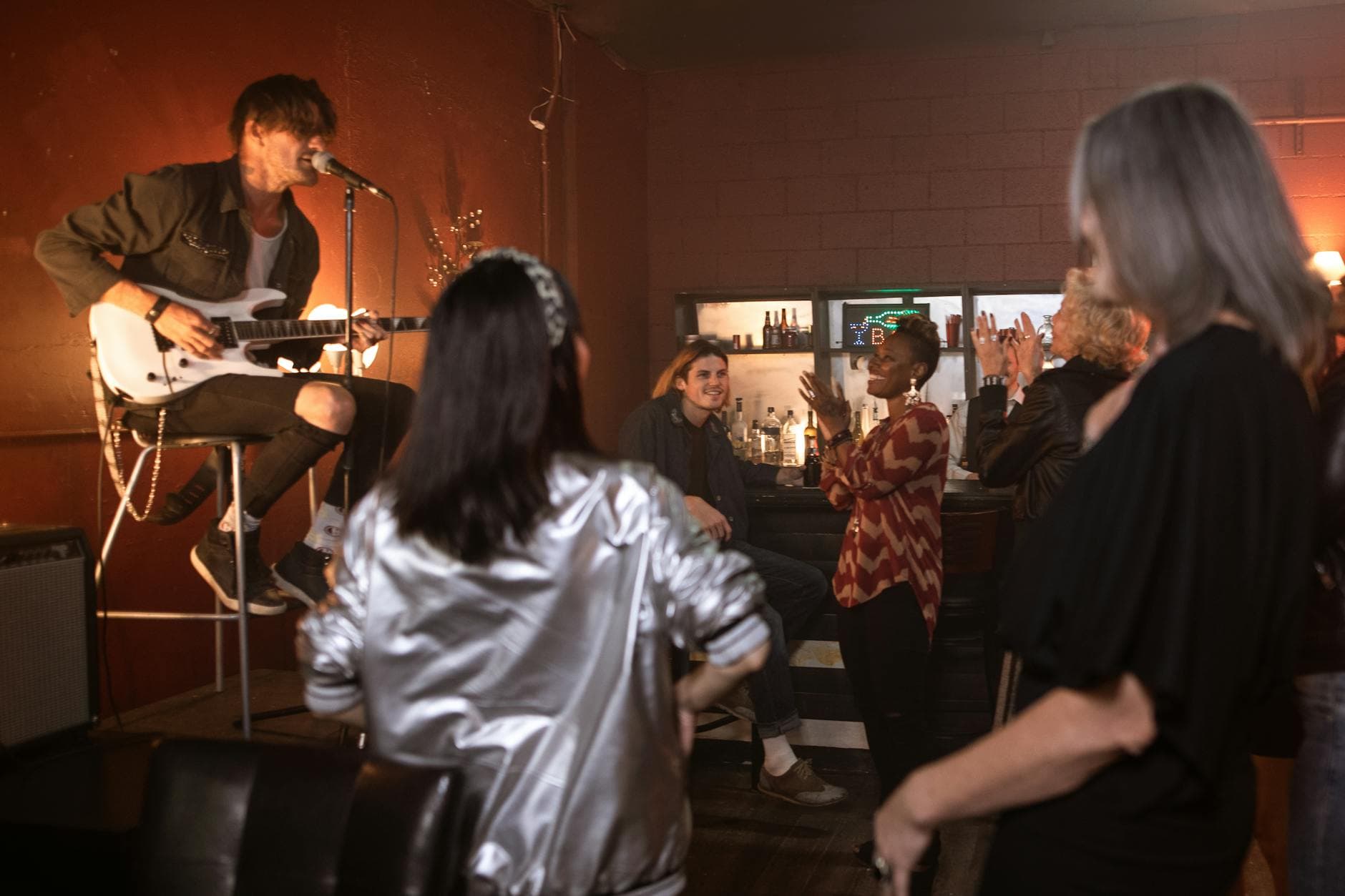 Live band playing at a bar